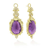 Crafted from luxurious 18K Gold, each earring features a breathtaking pear-shape amethyst centerpiece, known for its rich, vibrant purple hue. The gemstone is framed in intricate gold scrollwork, reminiscent on the Baroque artistry.