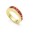 Square cut garnet gemstones surrounded by smooth 18K gold form this stacking ring.