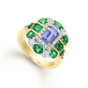 Tanzanite and tsavorite garnet gemstones are set in 18k gold and 18k white gold to form this intricate statement ring. LAGOS diamonds are the highest quality natural stones.