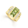 Radiant and eye-catching, this peridot and diamond ring offers a perfect combination of color vibrant color and classic luxury. Featuring a striking baguette-cut peridot with its fresh, vibrant green hue. On each side, a row of brilliant diamonds add