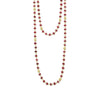 A ruby gemstone necklace with 18K gold Caviar beading form this beaded necklace.