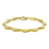 18K gold and yellow sapphire gemstones form this luxe link wave bracelet.