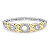 Five diamond circles set in 18K gold X-motifs accent this sterling silver Caviar beaded bracelet. LAGOS diamonds are the highest quality natural stones.