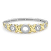 Five diamond circles set in 18K gold X-motifs accent this sterling silver Caviar beaded bracelet. LAGOS diamonds are the highest quality natural stones.