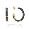 Black ceramic beading highlighted by four 18K gold stations form these hoop earrings.