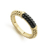 Black ceramic stacking ring with 18k gold Caviar beading.