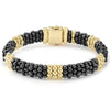 Five 18K gold stations highlighted by black ceramic Caviar beading on this signature bracelet.