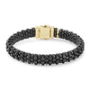 Classic black ceramic Caviar beading forms this signature bracelet. Finished with a classic 18K gold box clasp.