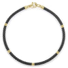 Five 18K gold stations highlighted by black ceramic Caviar beading form this signature bracelet.